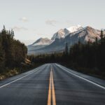 wide road under blue sky